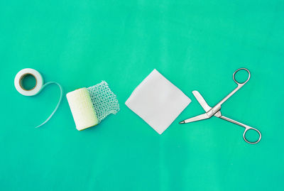 High angle view of dental equipment on blue wall