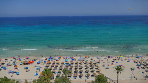 High angle view of beach against blue sky