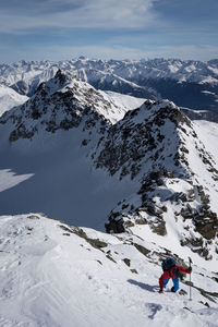 High angle view of people on snowcapped mountain