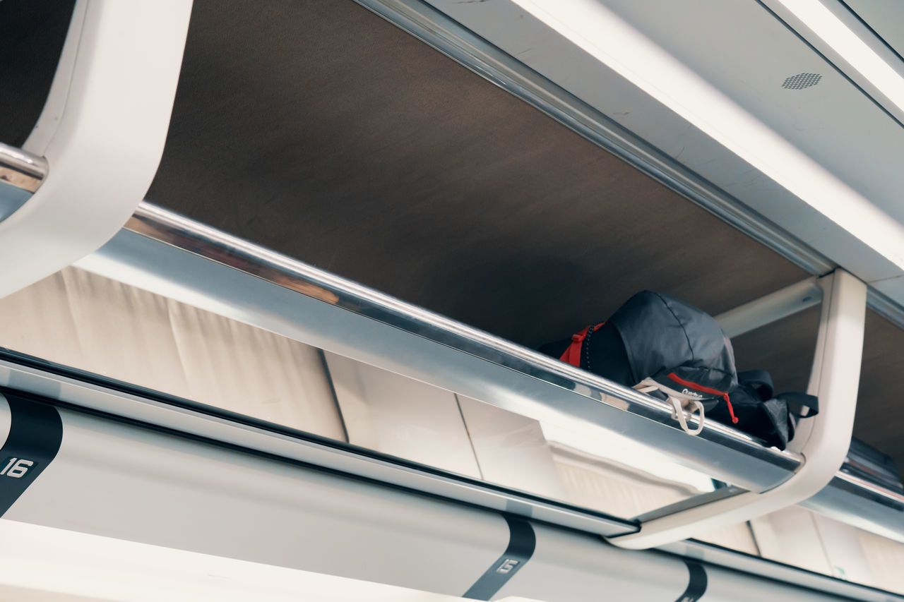 LOW ANGLE VIEW OF MEN WORKING AT OFFICE