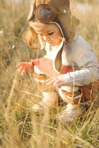 Woman looking at camera on field