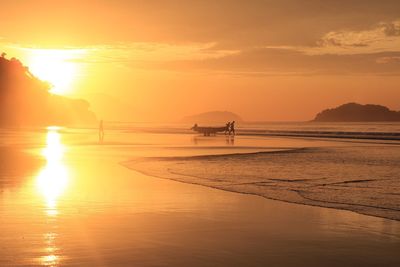 Scenic view of sunset over sea