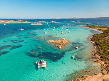 High angle view of sea shore against sky