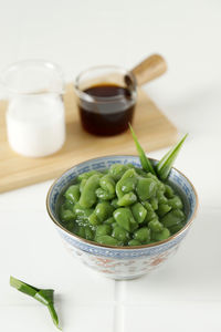 Lod chong or cendol is an iced sweet dessert, served with palm sugar syrup 