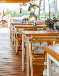 Empty chairs and table in restaurant