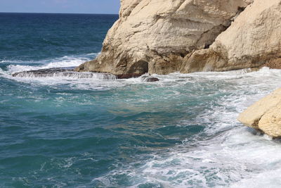 Scenic view of rocks in sea