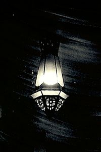 Low angle view of illuminated lamp