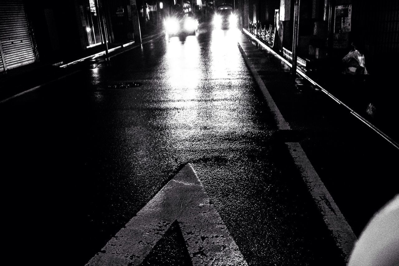 night, wet, illuminated, city, street, the way forward, reflection, water, built structure, incidental people, city life, transportation, architecture, walking, rain, building exterior, diminishing perspective, high angle view