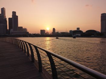 Scenic view of buildings against sky during sunset