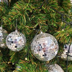 Close-up of christmas decoration hanging at night