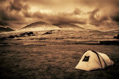 Tent on mountain against sky