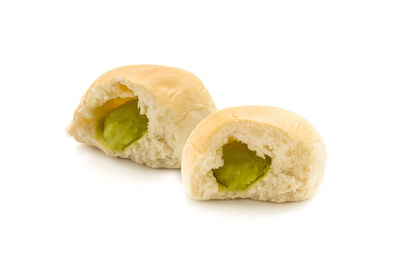 Close-up of bread against white background