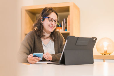 White woman working from home