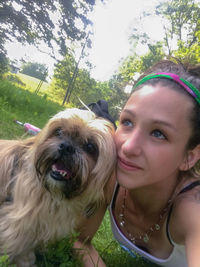 Portrait of woman with dog