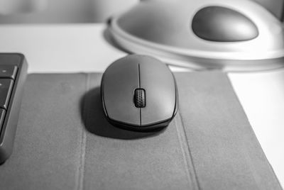 Close-up of computer mouse on table