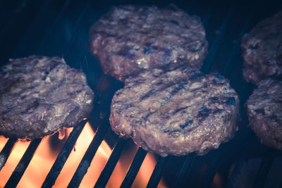 High angle view of meat on barbecue