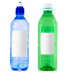 Close-up of green bottle against white background