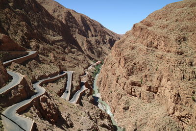 High angle view of mountain roads against clear sky