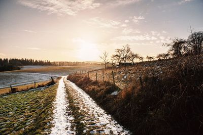 Scenic view of landscape against sky during sunset