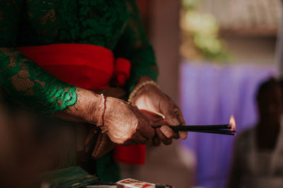 Midsection of woman working