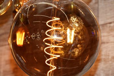 Close-up of illuminated light bulb