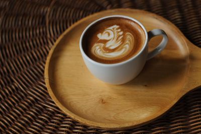 Close-up of cappuccino on table