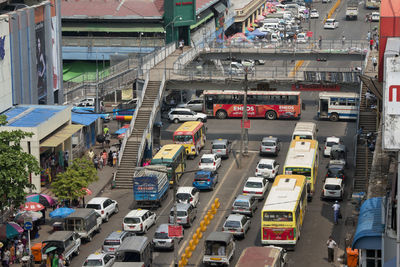 High angle view of vehicles on street in city