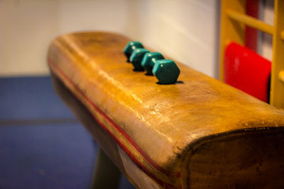 Close-up of figurine on table at home