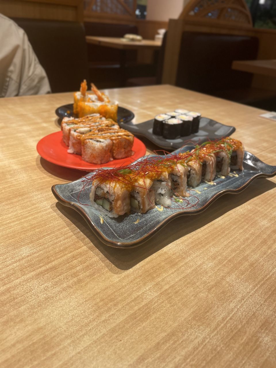 food and drink, food, table, meal, seafood, freshness, healthy eating, wellbeing, indoors, cuisine, dish, japanese food, asian food, plate, lunch, no people, fish, culture, restaurant, animal, wood, meat, dinner, sushi, business, rice, high angle view