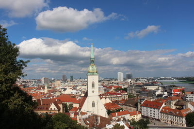 High angle view of bratislava townscape against cloudy sky with cathedral