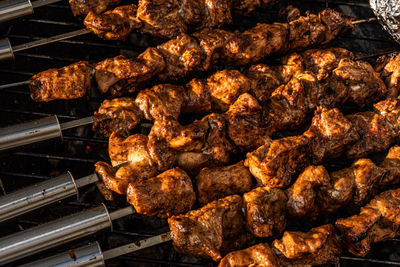 Close-up of meat on barbecue grill