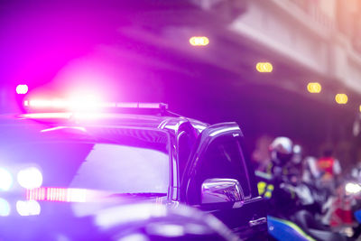 Cars on street at night