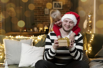 Merry christmas and happy new year. christmas gift surprise. father and daughter