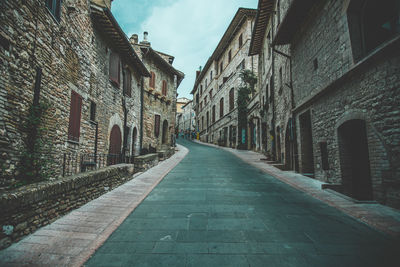 Narrow alley along buildings