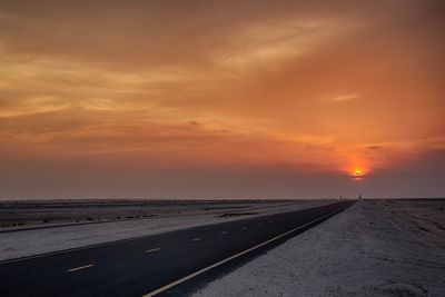 Road against sky during sunset