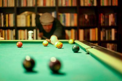 Man playing snooker