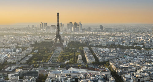 Aerial view of paris at sunset with the eiffel tower in background
