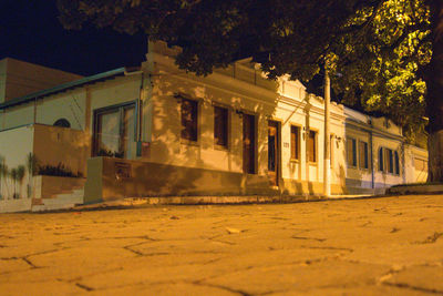 Buildings in city at night