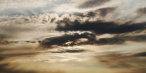 Low angle view of clouds in sky during sunset