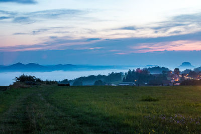 Scenic view of landscape against sky during sunset