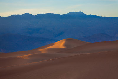 Scenic view of desert against sky