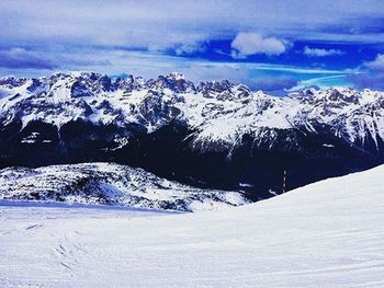 Scenic view of snow covered mountains