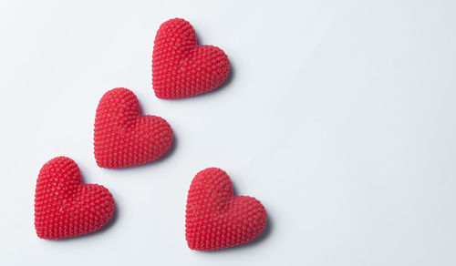 Close-up of heart shape over white background