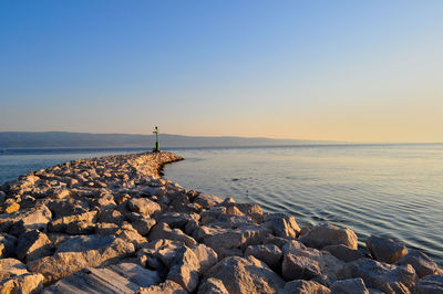 Scenic view of sea against clear sky