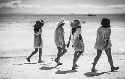 Woman standing on beach