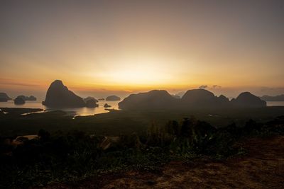 Scenic view of mountains against sky during sunset