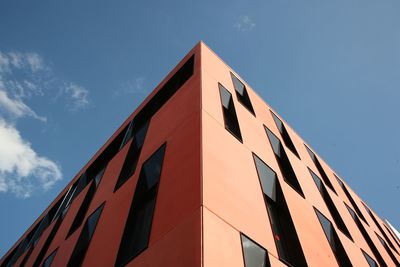 Low angle view of building against blue sky