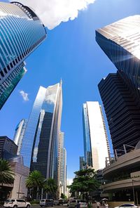 Low angle view of modern buildings against sky