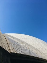 Low angle view of building against blue sky