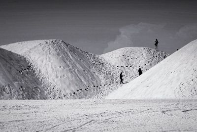 People on snow covered mountain